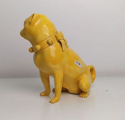 CHINA
Yellow glazed ceramic figurine of a...