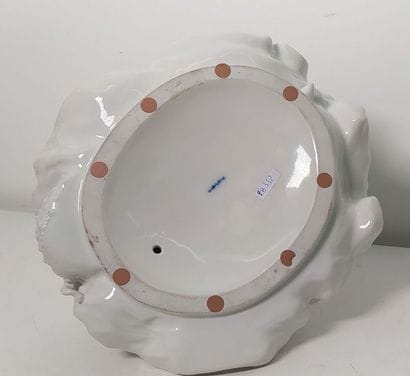 White porcelain subject representing a violin...