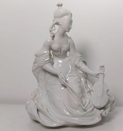 White porcelain subject representing a violin...