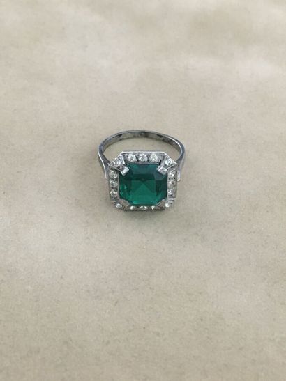 Silver ring set with a fancy green stone
Gross...