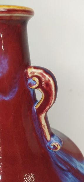 CHINA
Oxblood ceramic vase with handles 
Height...