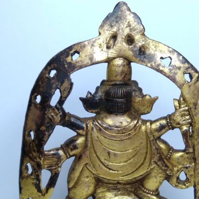 TIBET, 20th century 
Three gilded bronze...