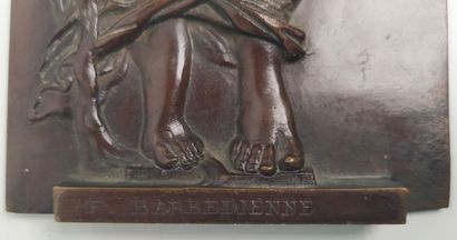 Bronze bas-relief of a woman with a jug
Signed...