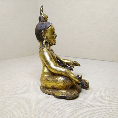 TIBET, 20th century 
Three gilded bronze...