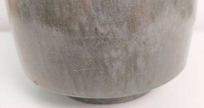 CHINA 
High-necked green celadon-glazed porcelain...