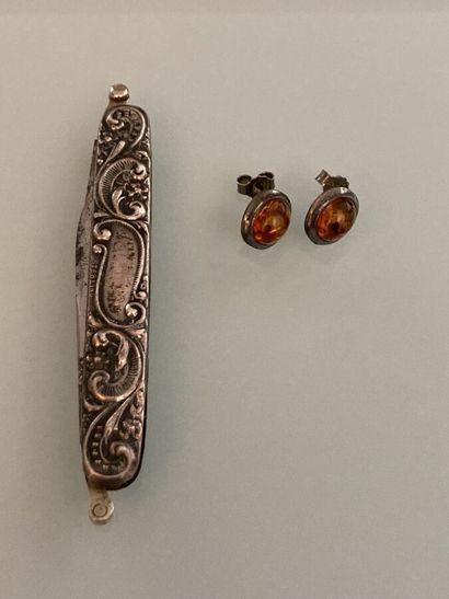 Pair of amber ? metal earrings

A small metal...