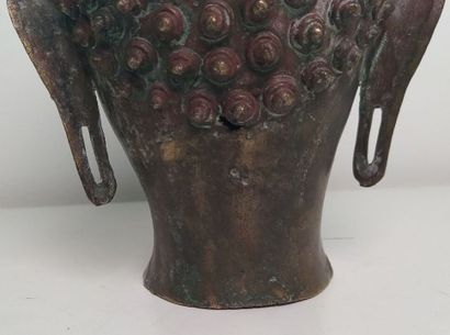 Gilded bronze Buddha head, adorned with an...