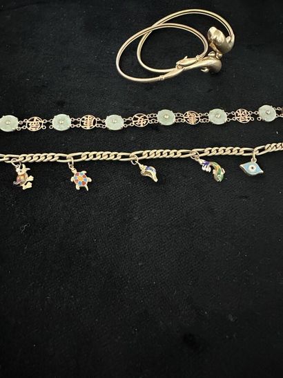 Two rigid bracelets in low-title yellow gold...