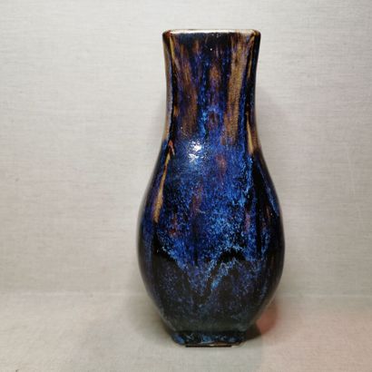 CHINA
Three hu vases in cracked and flamed...