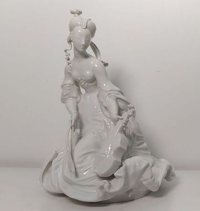 White porcelain subject representing a violin...