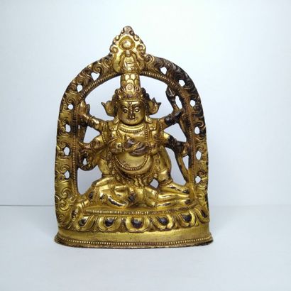 TIBET, 20th century 
Three gilded bronze...