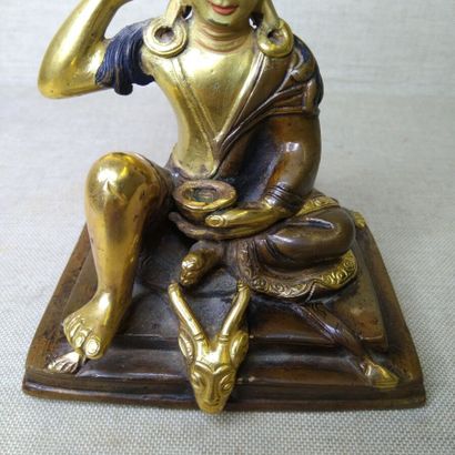 TIBET, 20th century 
Three gilded bronze...