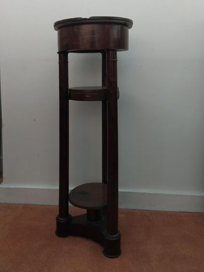 Mahogany veneered sellette, resting on three...
