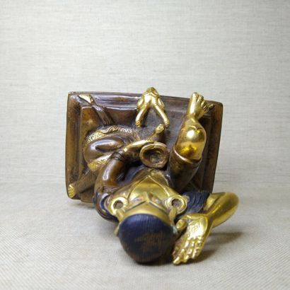 TIBET, 20th century 
Three gilded bronze...