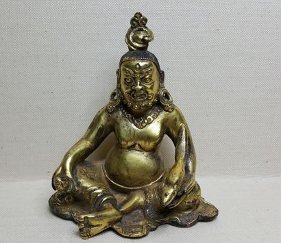 TIBET, 20th century 
Three gilded bronze...