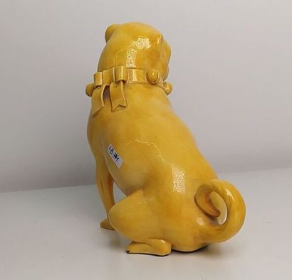 CHINA
Yellow glazed ceramic figurine of a...