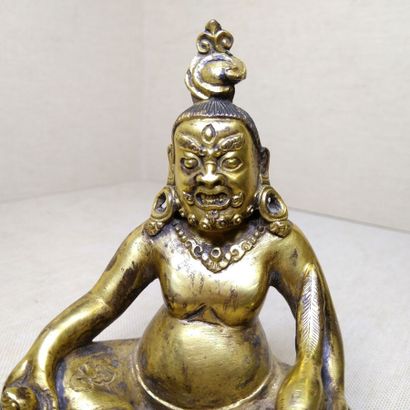 TIBET, 20th century 
Three gilded bronze...