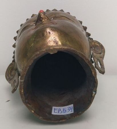 Gilded bronze Buddha head, adorned with an...