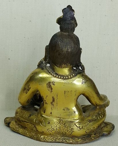 TIBET, 20th century 
Three gilded bronze...