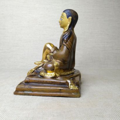 TIBET, 20th century 
Three gilded bronze...