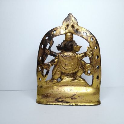 TIBET, 20th century 
Three gilded bronze...