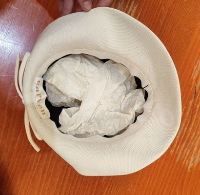 CARVEN
Set of two . hats, one navy blue and...