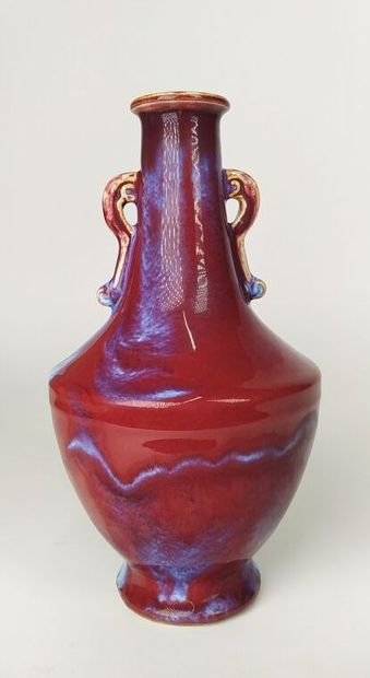 CHINA
Oxblood ceramic vase with handles 
Height...