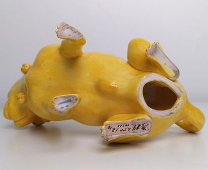 CHINA
Yellow glazed ceramic figurine of a...