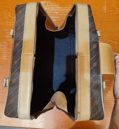 GUCCI
Set of two suitcases in monogrammed...