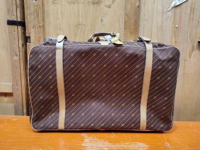 GUCCI
Set of two suitcases in monogrammed...