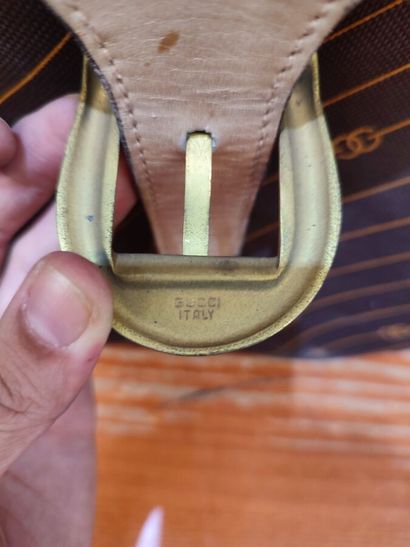 GUCCI
Set of two suitcases in monogrammed...