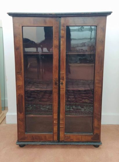 Small veneered bookcase opening with two...