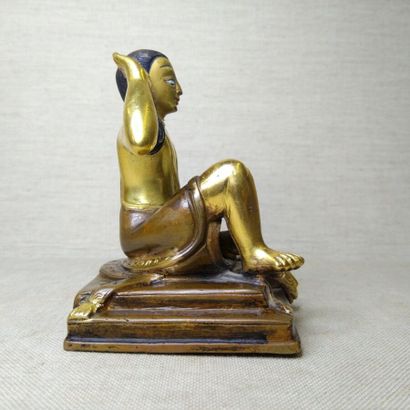 TIBET, 20th century 
Three gilded bronze...