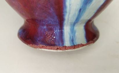 CHINA
Oxblood ceramic vase with handles 
Height...