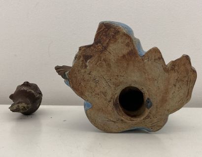 Stoneware figure, blue enamel tunic
Height...
