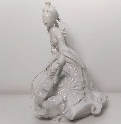 White porcelain subject representing a violin...