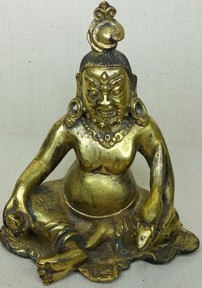 TIBET, 20th century 
Three gilded bronze...