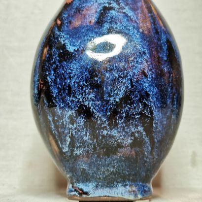 CHINA
Three hu vases in cracked and flamed...