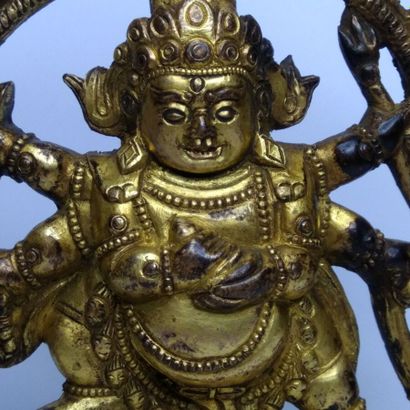 TIBET, 20th century 
Three gilded bronze...