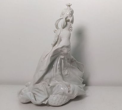 White porcelain subject representing a violin...