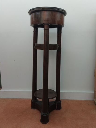 Mahogany veneered sellette, resting on three...