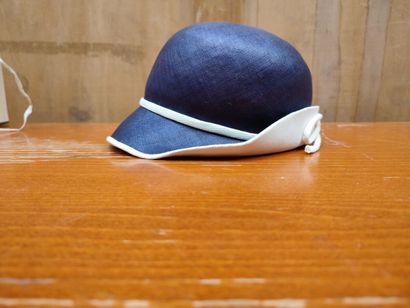 CARVEN
Set of two . hats, one navy blue and...