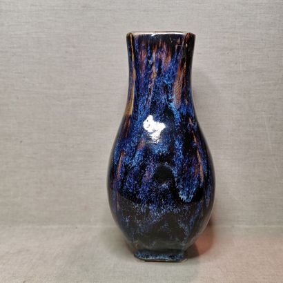 CHINA
Three hu vases in cracked and flamed...