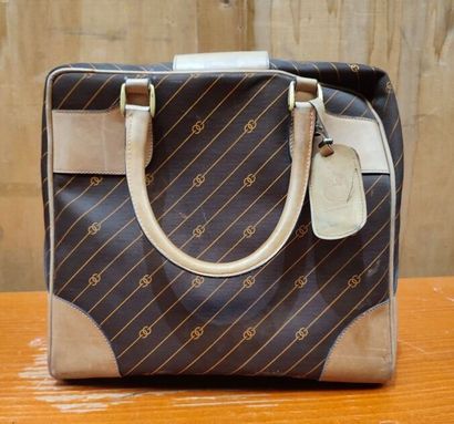 GUCCI
Set of two suitcases in monogrammed...