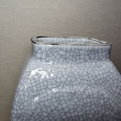CHINA
Three hu vases in cracked and flamed...