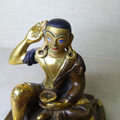 TIBET, 20th century 
Three gilded bronze...