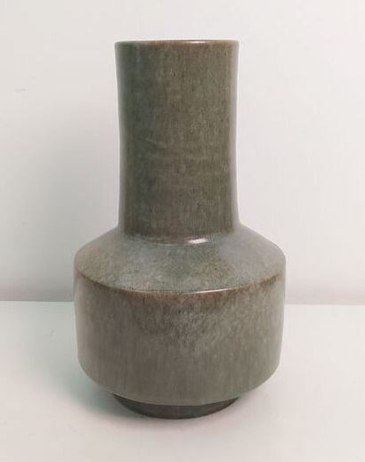 CHINA 
High-necked green celadon-glazed porcelain...