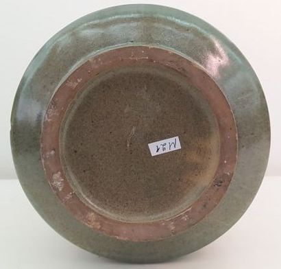 CHINA 
High-necked green celadon-glazed porcelain...