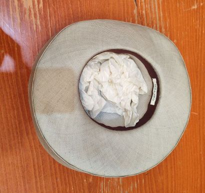 CARVEN
Set of two . hats, one navy blue and...