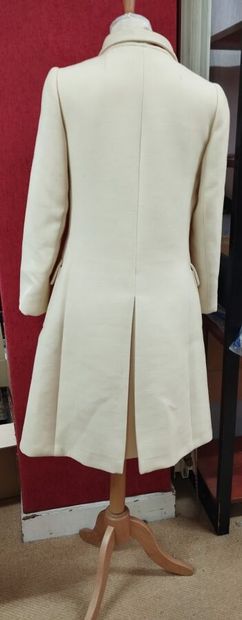 GIVENCHY, New boutique
Cream double-breasted...